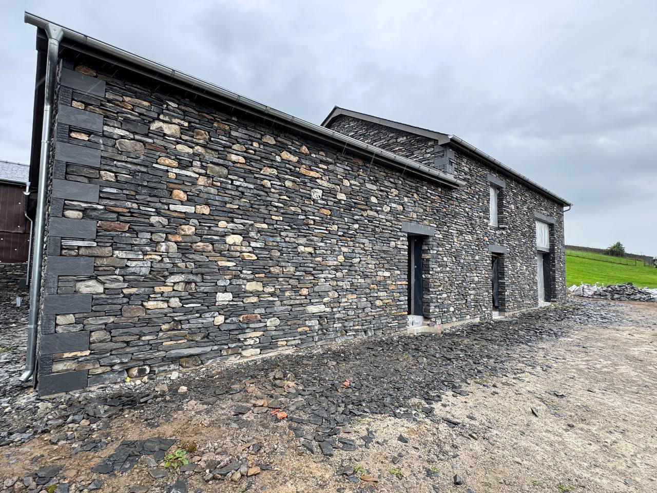 Large building stone-faced by Sam Shaw Kilburn Stonework Ltd